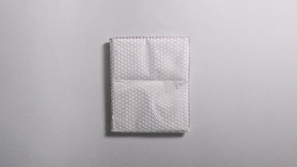 PIÈCE N°6 - Wrapped Document Photo Mockup