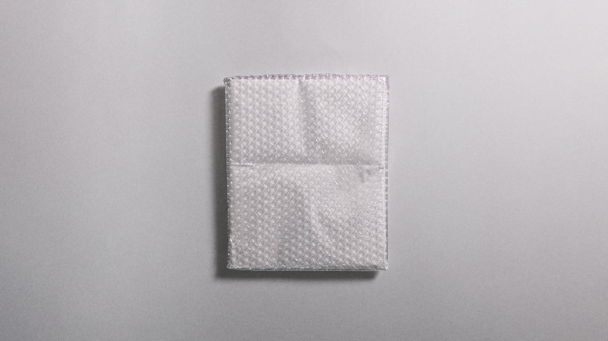 PIÈCE N°6 - Wrapped Document Photo Mockup