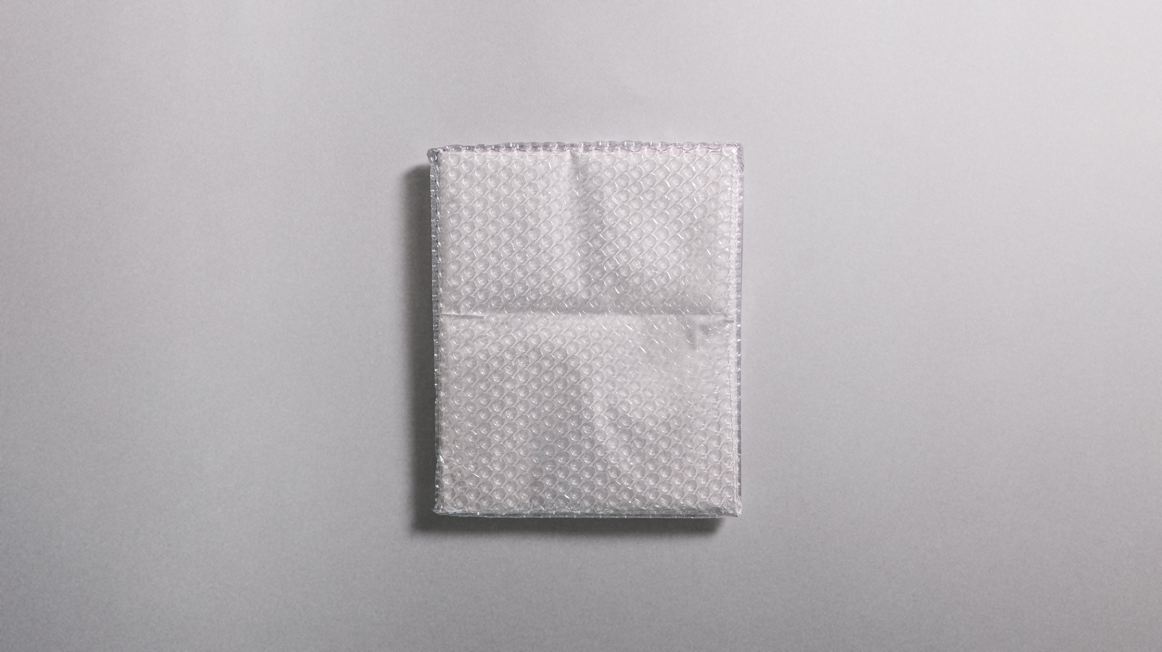 PIÈCE N°6 - Wrapped Document Photo Mockup