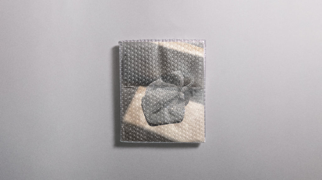 PIÈCE N°6 - Wrapped Document Photo Mockup